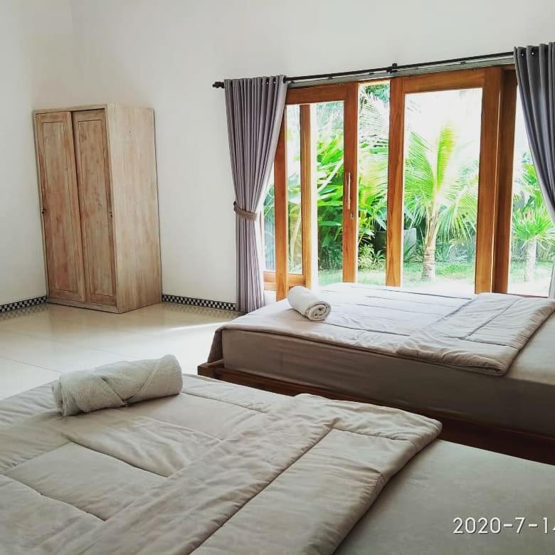 Harris Surf Villa Pulukan Bagian luar foto